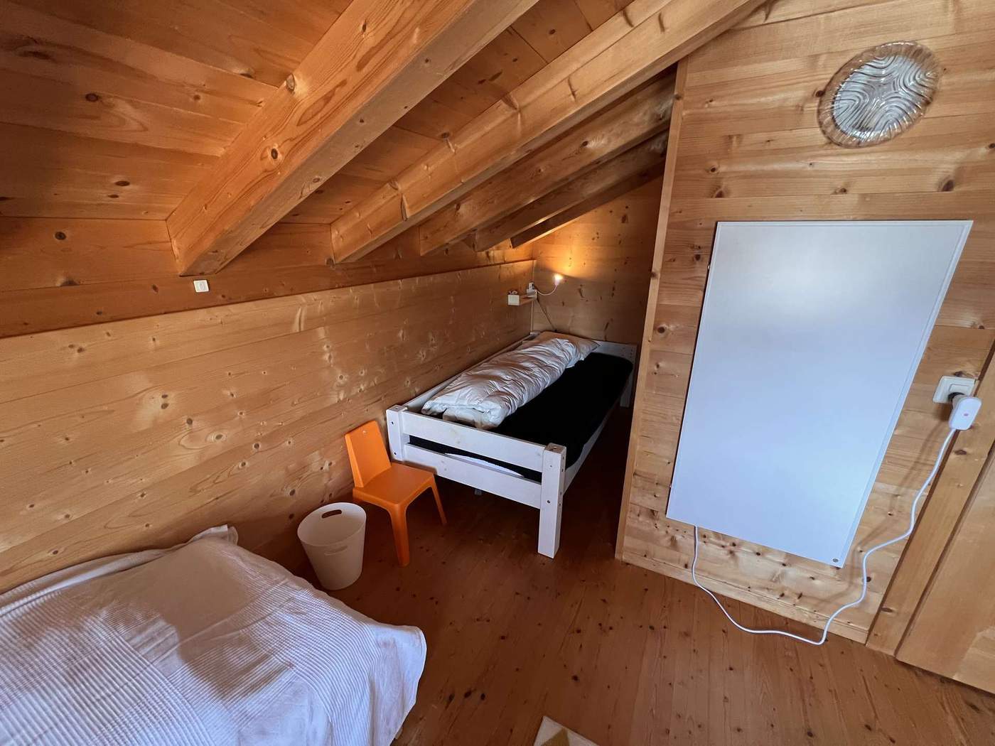 Attic room with two single beds