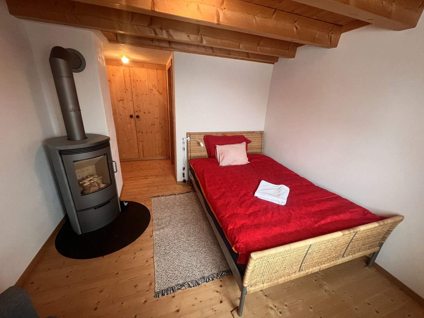 Bedroom with soapstone stove